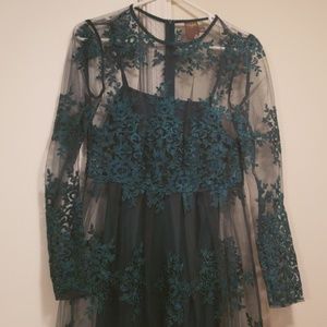 Beautiful emerald dress with lace overlay.